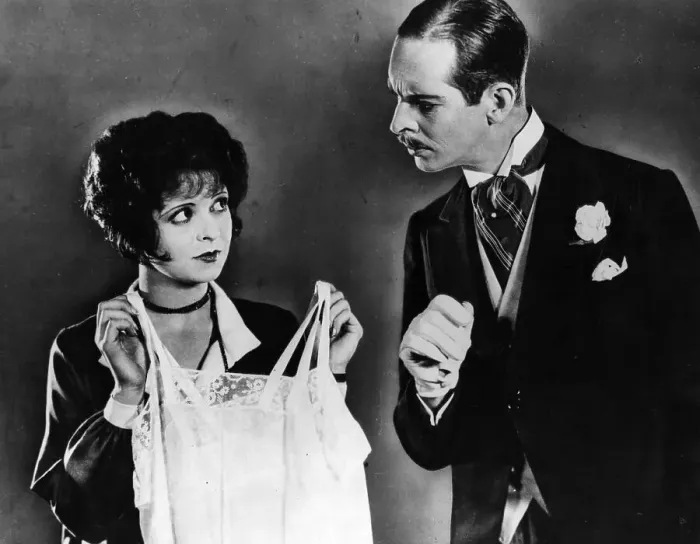 Framed Print : Underwear. circa 1927: Clara Bow holds up some underwear Framed Print : Underwear. circa 1927: Clara Bow holds up some underwear