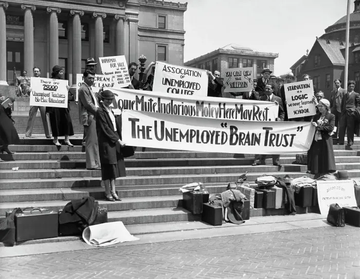 Framed Print : Unemployed Graduates With Banners Framed Print : Unemployed Graduates With Banners