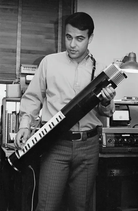 Framed Print : Tubon. An unspecified musician wearing a shirt that is open at the collar Framed Print : Tubon. An unspecified musician wearing a shirt that is open at the collar