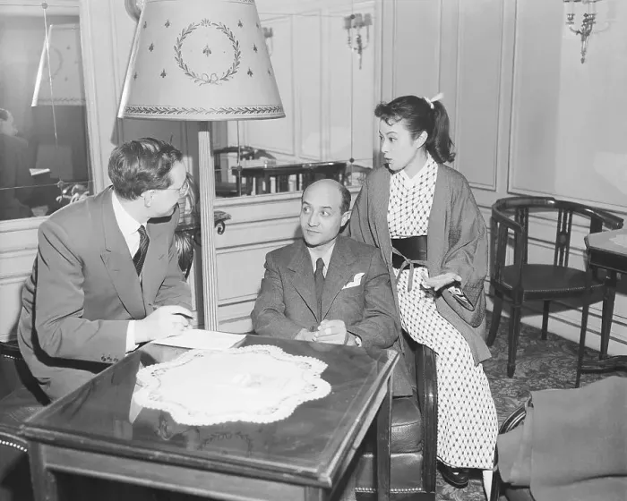 Framed Print : UPI Journalist Interviewing Japanese Actress and Her American Husband Framed Print : UPI Journalist Interviewing Japanese Actress and Her American Husband