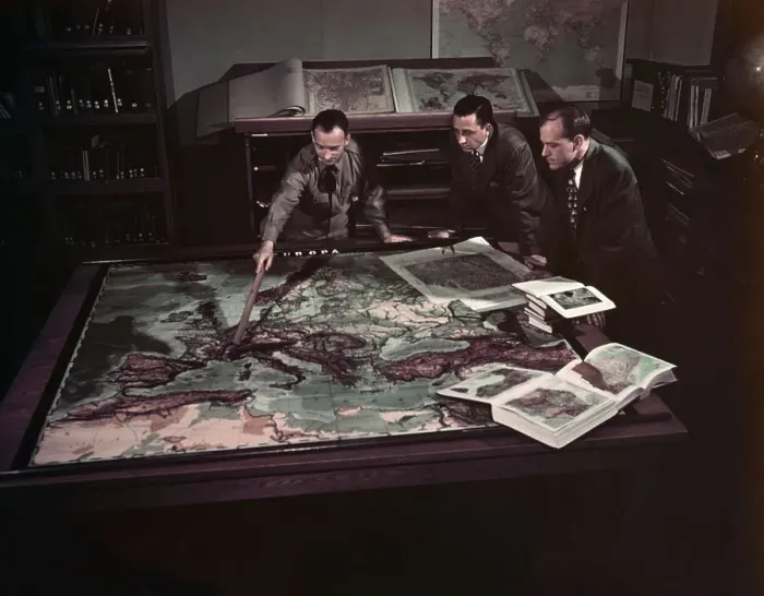 Framed Print : U.S. Air Force Personnel Looking at German Map Framed Print : U.S. Air Force Personnel Looking at German Map