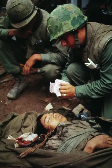 Framed Print : U.S. Marines Treating Wounded North Vietnamese Soldier Framed Print : U.S. Marines Treating Wounded North Vietnamese Soldier