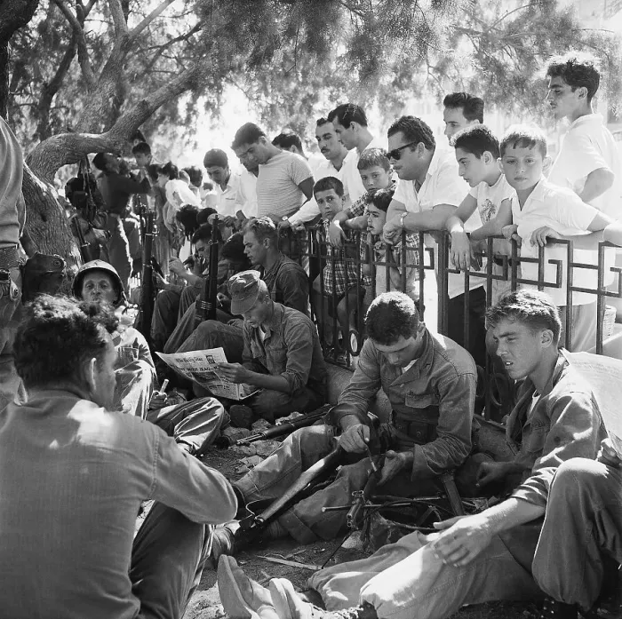 Framed Print : U.S. Soldiers Relaxing in Public Square Framed Print : U.S. Soldiers Relaxing in Public Square