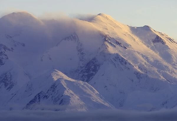 USA, Alaska, Denali National Park, Mt. McKinley and fog at sunset