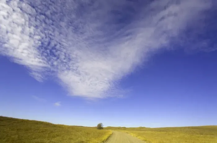 Framed Print : USA, central Nebraska, clouds above gravel ranch road and grassland Framed Print : USA, central Nebraska, clouds above gravel ranch road and grassland