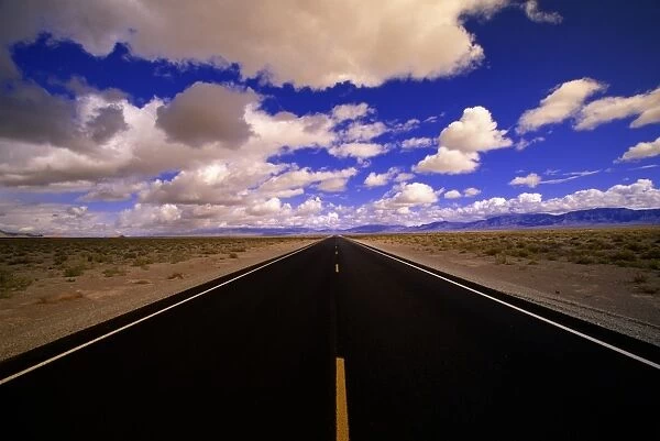 Usa, Nevada, Highway and Cumulus Clouds