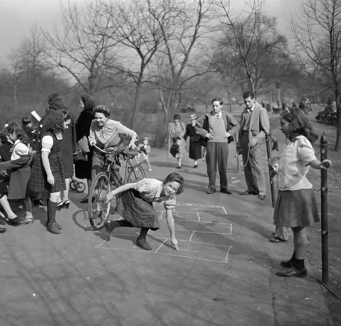 Framed Print : USA, New York City, Manhattan, Central Park, Girls (8-9) playing hop scotch Framed Print : USA, New York City, Manhattan, Central Park, Girls (8-9) playing hop scotch