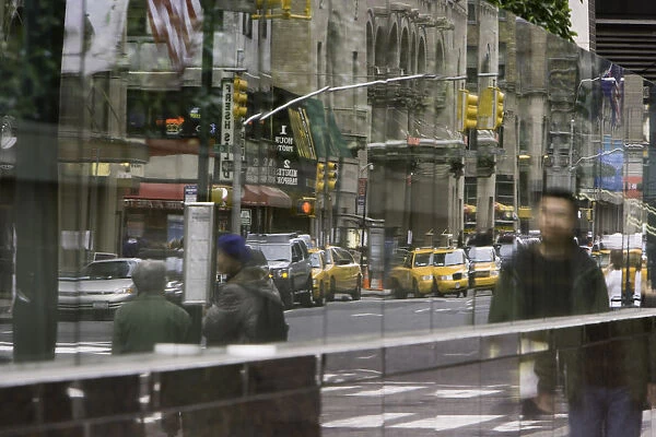 USA, New York, New York City, reflecting street scene