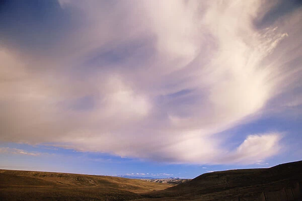 USA, Wyoming, altocumulus castelanus clouds over Red Desert