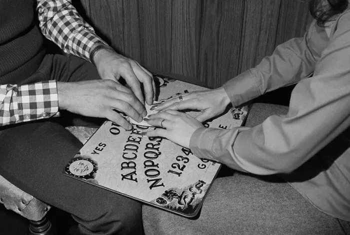 Framed Print : Using Ouija Board Framed Print : Using Ouija Board