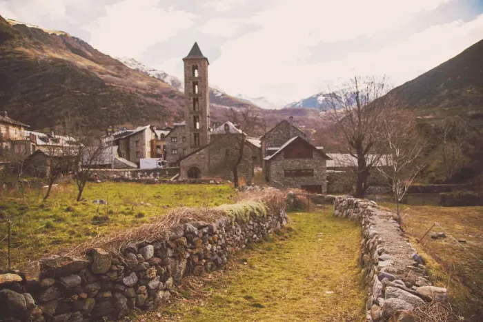 Framed Print : The Vall de Boi romanesque architecture with tall church and beautiful landscape in the Catalan Pyrenees Framed Print : The Vall de Boi romanesque architecture with tall church and beautiful landscape in the Catalan Pyrenees