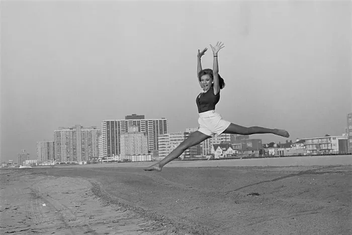 Framed Print : Vanessa Williams Leaping Through the Air on Beach Framed Print : Vanessa Williams Leaping Through the Air on Beach