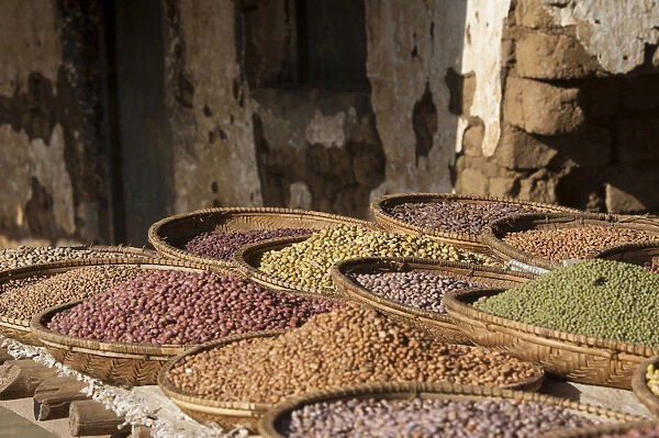 Various dried pulses in basket at market, Arusha, Tanzania, Africa