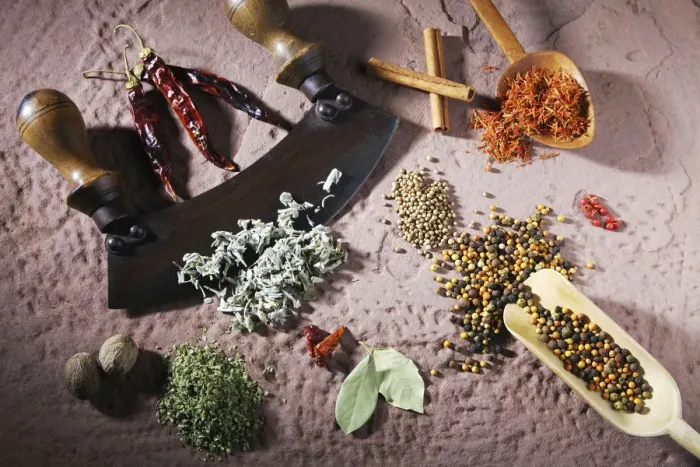 Framed Print : Various spices with a mincing knife on a sandstone base Framed Print : Various spices with a mincing knife on a sandstone base
