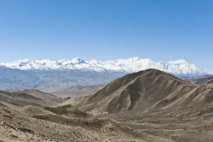 Framed Print : Vast landscape with the snow-covered mountains of the Annapurna Range at back, near Lo Manthang, Upper Mustang, Lo, Nepal Framed Print : Vast landscape with the snow-covered mountains of the Annapurna Range at back, near Lo Manthang, Upper Mustang, Lo, Nepal