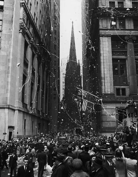 VE Day In New York; corner of Wall Street and Nassau Street in New York City during