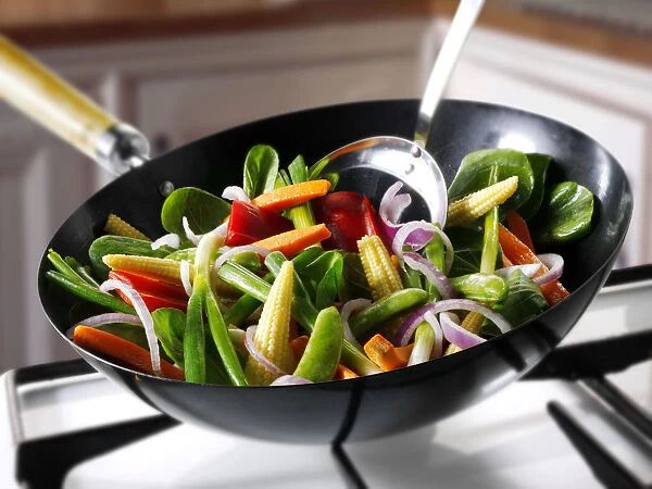 Vegetable stir-fry in a wok
