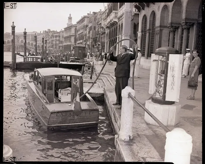 Framed Print : Venetian Man Filling His Boat With Gas Framed Print : Venetian Man Filling His Boat With Gas