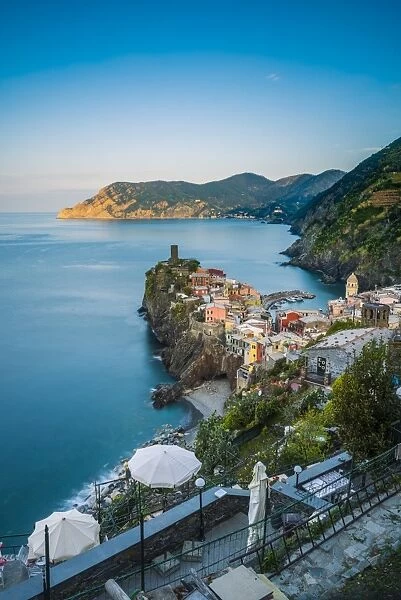Vernazza, Cinque Terre, La Spezia, Liguria, Italy. The village and the reef in the early morning light in spring