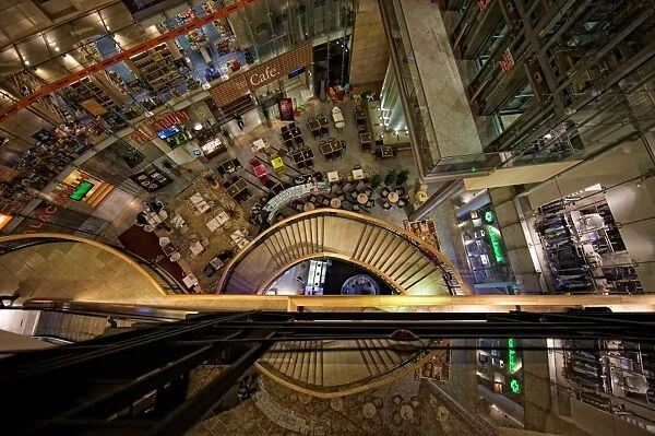 Vertigo. Sensation of falling down. Shot in a mall in Prague, with a reflection