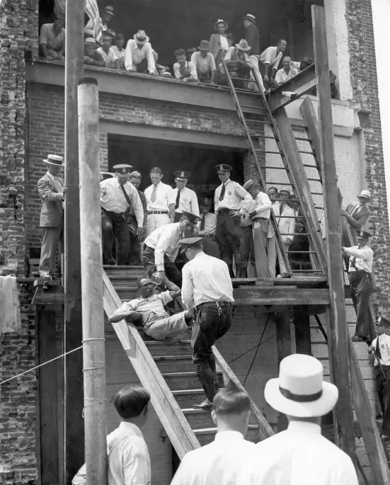 Framed Print : Veteran Being Pulled From Building Framed Print : Veteran Being Pulled From Building