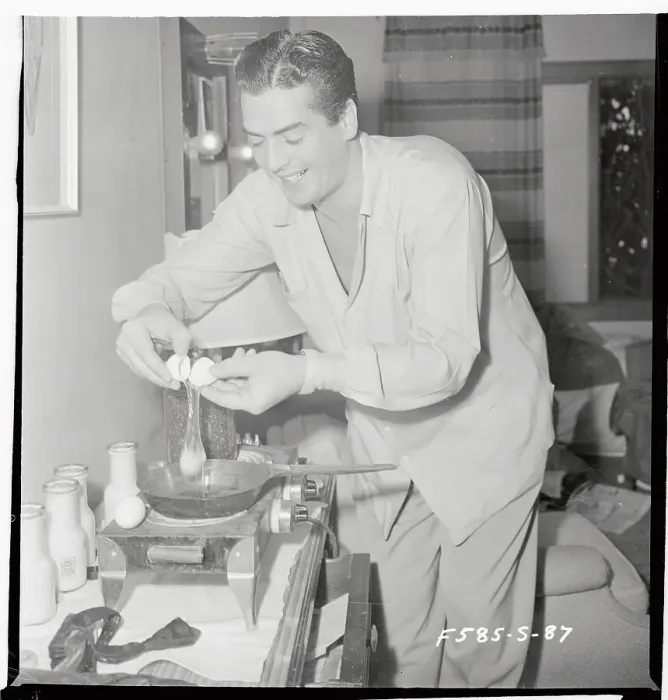 Framed Print : Victor Mature with Breakfast Framed Print : Victor Mature with Breakfast