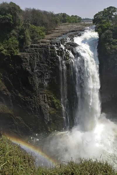Victoria Falls, mainfall with rainbow, view from Zimbabwe, Zambezi River, Zambia, Zimbabwe, Africa