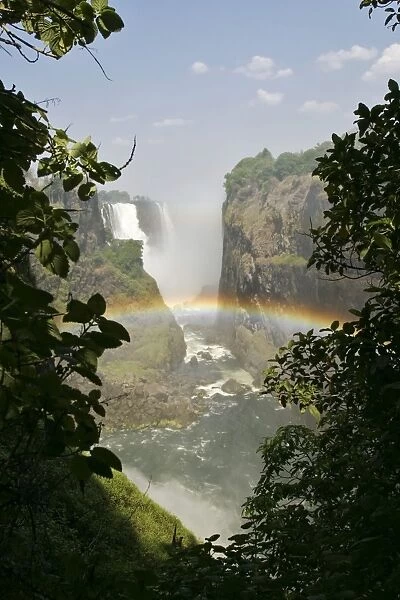 Victoria Falls with rainbow, view from Zimbabwe, Zambezi River, Zambia, Zimbabwe, Africa