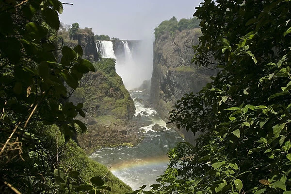 Victoria Falls with rainbow, view from Zimbabwe, Zambezi River, Zambia, Zimbabwe, Africa
