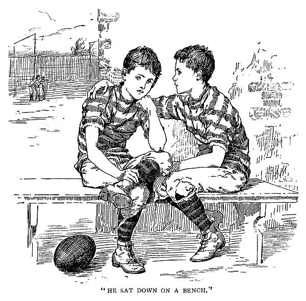 Two Victorian boys in rugby football kit talking on a bench