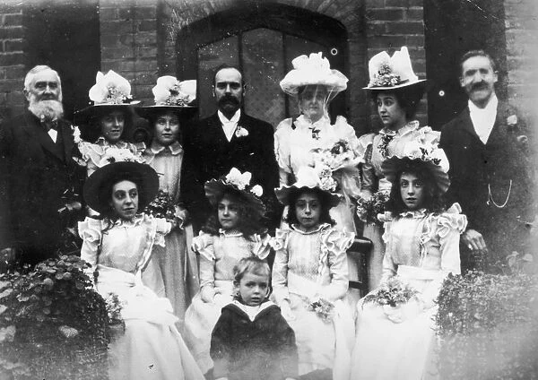 Victorian Wedding. A Victorian wedding party pose outside the church, 1897
