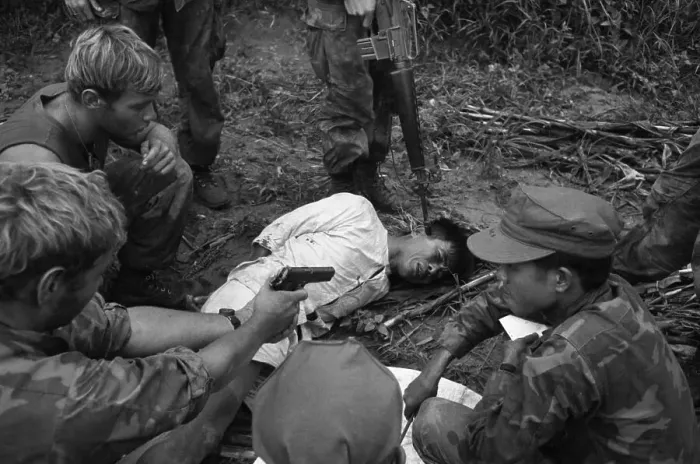 Framed Print : Viet Cong Questioned At Gunpoint Framed Print : Viet Cong Questioned At Gunpoint