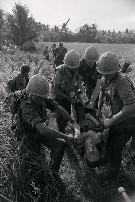 Framed Print : Vietnam Casualty Carried by His Comrades Framed Print : Vietnam Casualty Carried by His Comrades