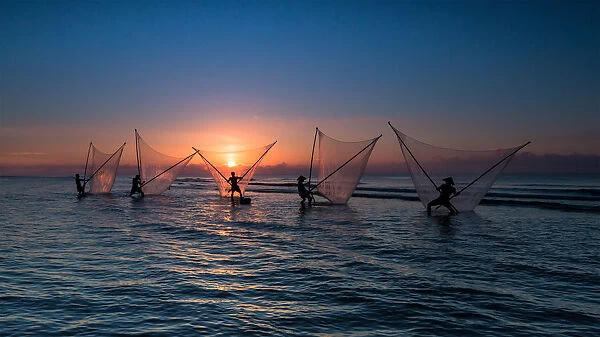 Vietnam - Fishermen are fishing on Nam Dinh beach