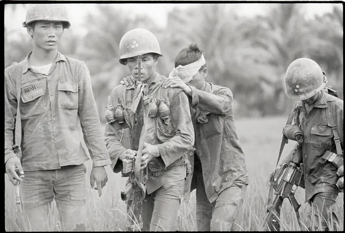 Framed Print : Vietnam Soldier Leading Blinded Comrade Framed Print : Vietnam Soldier Leading Blinded Comrade