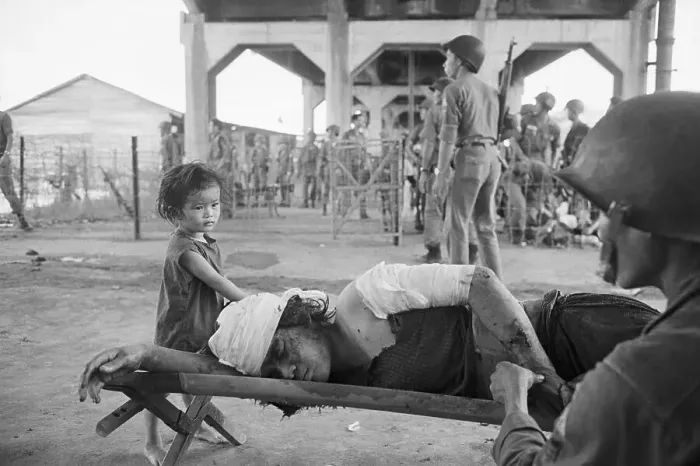 Framed Print : Vietnamese Child With Injured Mother Framed Print : Vietnamese Child With Injured Mother