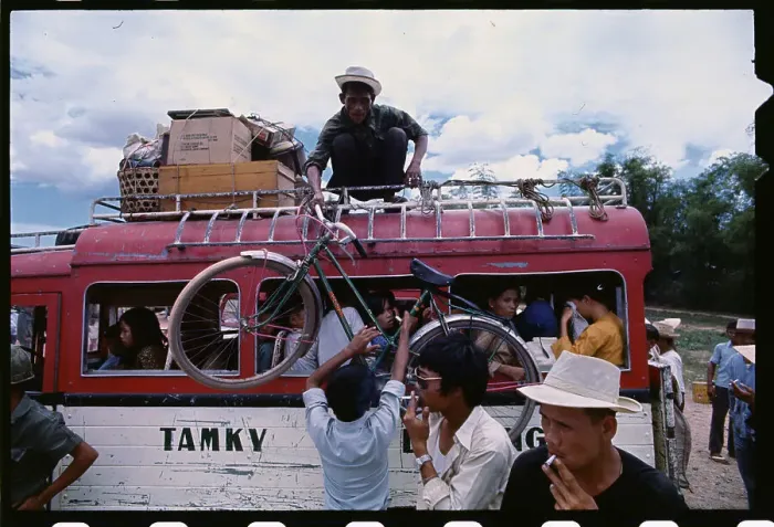 Framed Print : Vietnamese Refugees Boarding Bus Framed Print : Vietnamese Refugees Boarding Bus