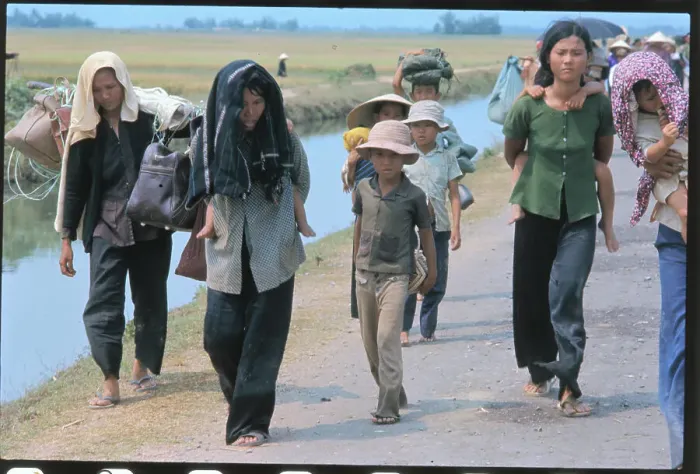 Framed Print : Vietnamese Refugees Fleeing on Foot Framed Print : Vietnamese Refugees Fleeing on Foot