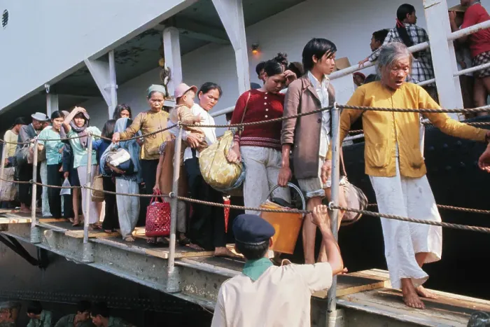 Framed Print : Vietnamese Refugees Leaving Ship Framed Print : Vietnamese Refugees Leaving Ship