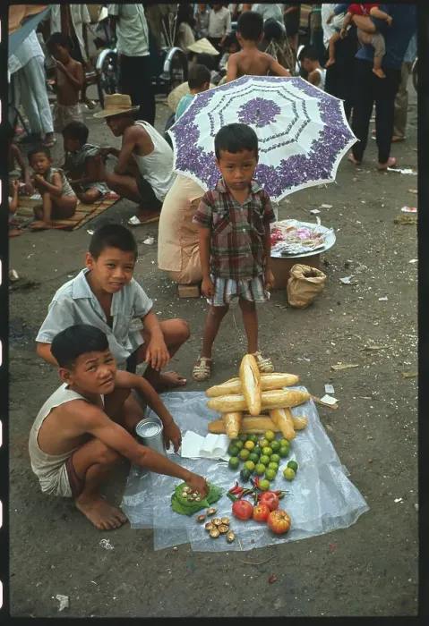 Framed Print : Vietnamese Refugees Selling Food at Market Framed Print : Vietnamese Refugees Selling Food at Market