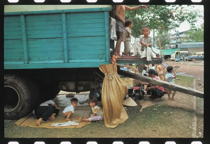 Framed Print : Vietnamese Refugees Using Truck as Shelter Framed Print : Vietnamese Refugees Using Truck as Shelter