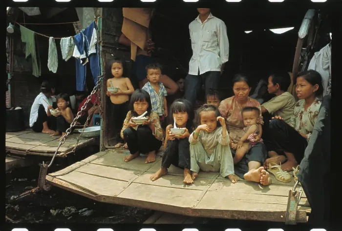 Framed Print : Vietnamese Refugees Using Truck as Shelter Framed Print : Vietnamese Refugees Using Truck as Shelter
