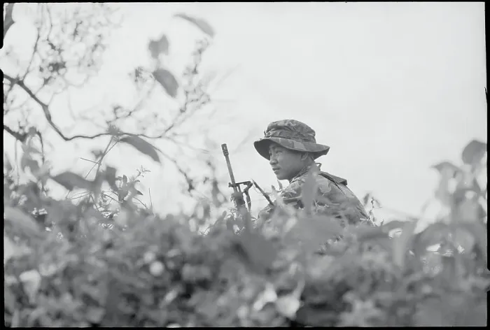 Framed Print : Vietnamese Soldier Sitting in Grass Framed Print : Vietnamese Soldier Sitting in Grass