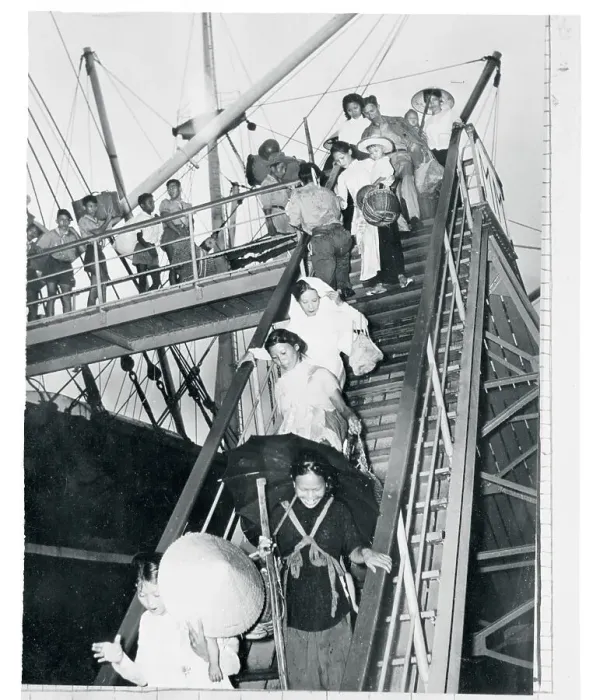 Framed Print : Vietnamese Travelers Goods Being Unloaded from Ship Framed Print : Vietnamese Travelers Goods Being Unloaded from Ship