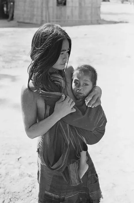 Framed Print : Vietnamese Woman Cuddling Her Child Framed Print : Vietnamese Woman Cuddling Her Child