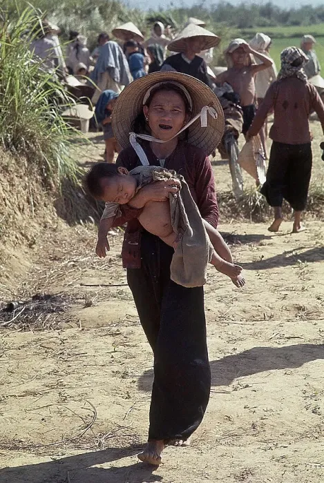 Framed Print : Vietnamese Woman Holding Child Framed Print : Vietnamese Woman Holding Child