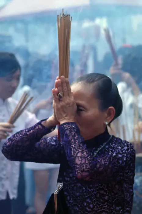 Framed Print : Vietnamese Woman Performing Ritual During Tet Framed Print : Vietnamese Woman Performing Ritual During Tet