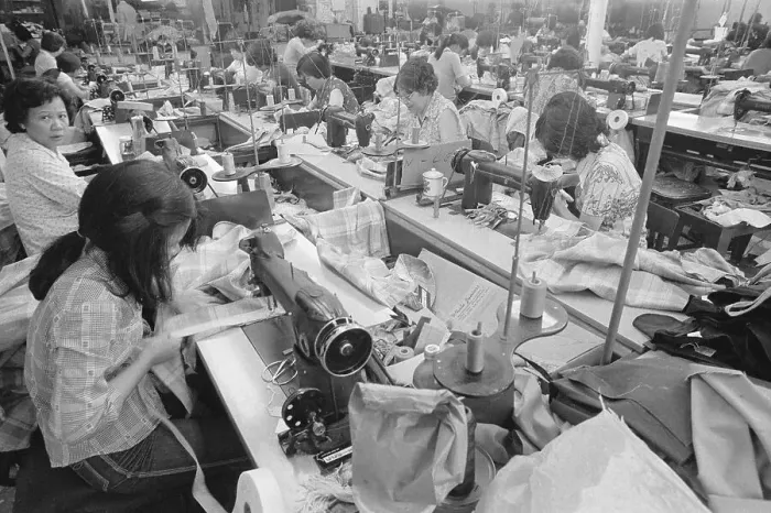 Framed Print : View of Asian Women Toiling in Sweatshop