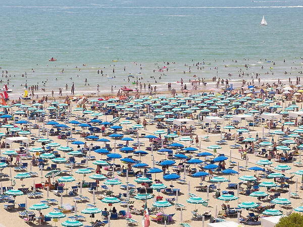 View of the beach with parasols, sun loungers and bathers, Lignano Sabbiadoro, Udine, Adriatic Coast, Italy, Europe