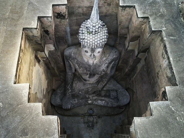 Top view of Big Buddha at Wat Si Chum in Sukhothai Historical Park, Thailand